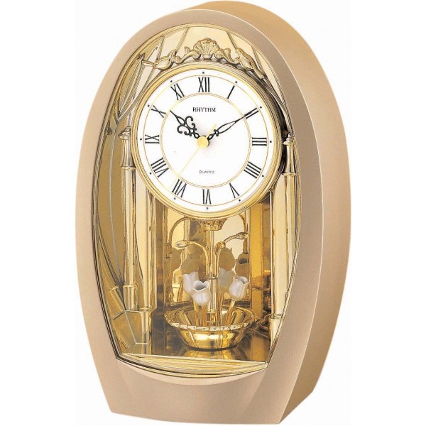 Rhythm gold oval contemporary motion clocks 